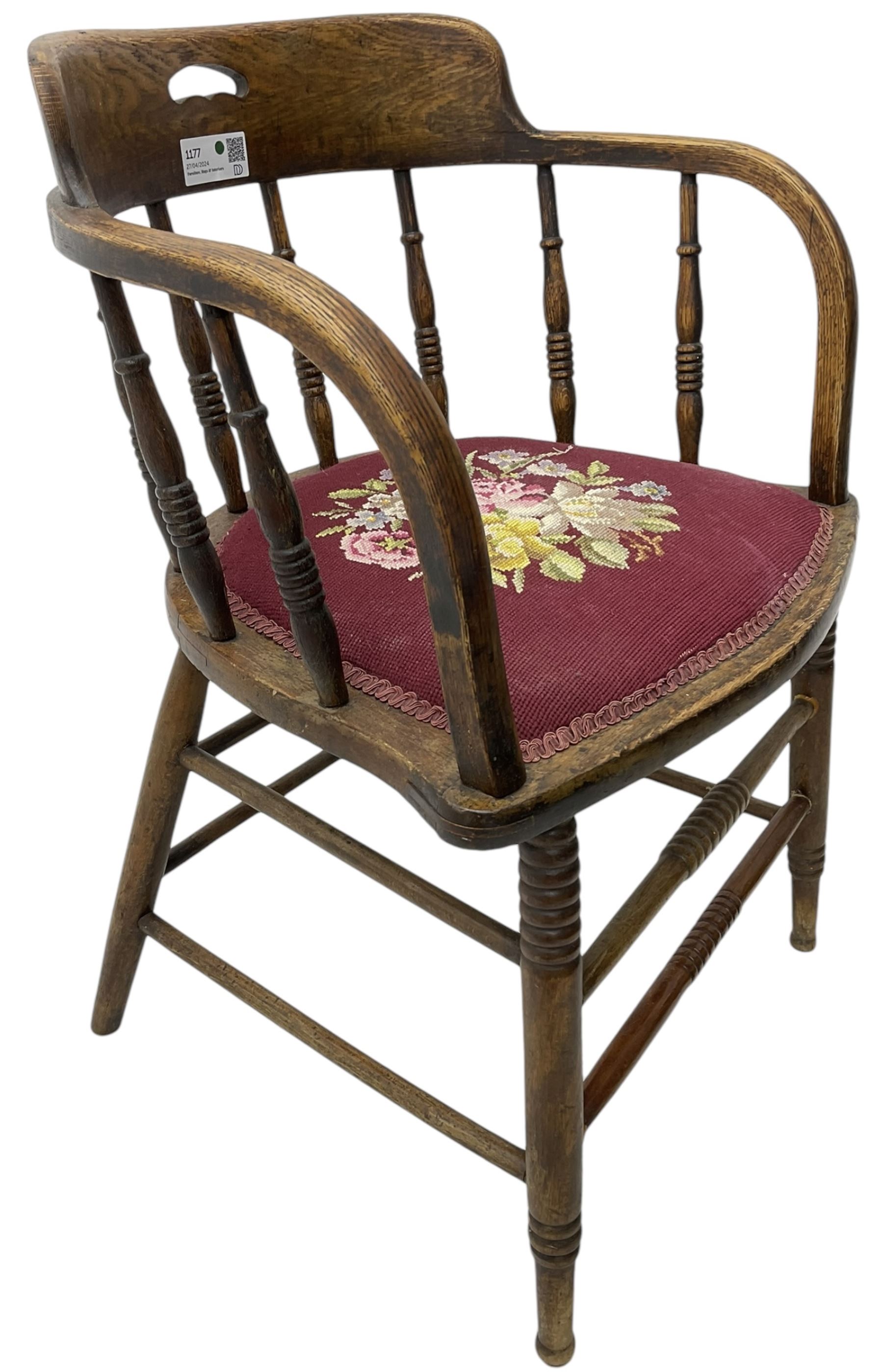 Early 20th century American oak smokers bow tub armchair, shaped cresting rail with pierced handle over ring turned spindle back, seat upholstered in pink tapestry fabric (W56cm, H73cm); small 20th century walnut occasional table on turned supports (W43cm, H70cm, D33cm)