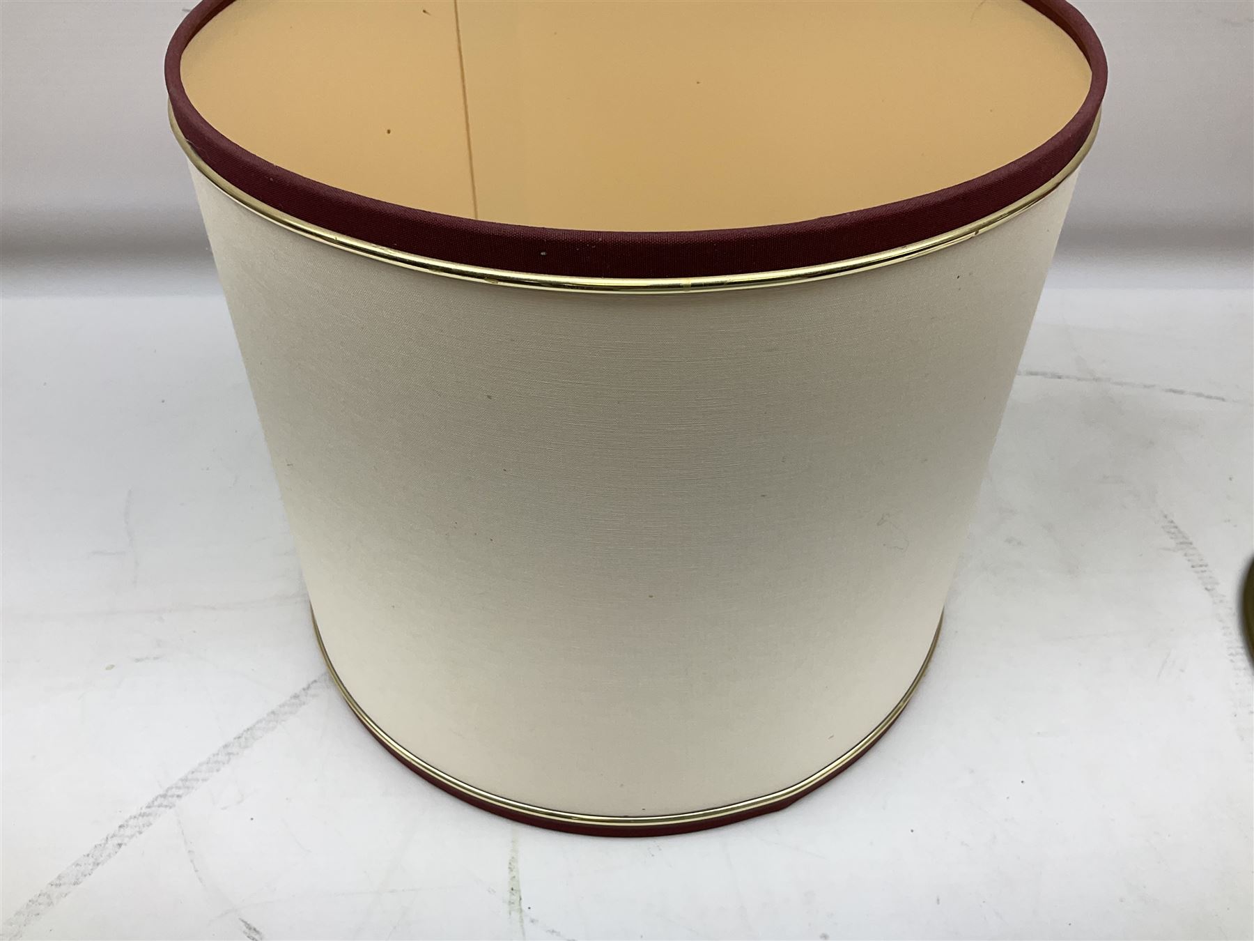 Poole Pottery table lamp in Volcano pattern of cylindrical form, with a cream lampshade, lamp H30cm