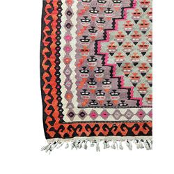 Small Kilim rug decorated with geometric motifs (135cm x 88cm), and a flat-woven rug, decorated in horizontal bands, stylised animal and plant motifs (100cm x 111cm)