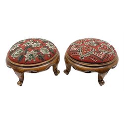 Pair of Victorian beadwork footstools of circular form, with floral beadwork upholstery upon walnut bases, each with three cabriole legs with knuckle feet, H16cm D30cm