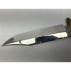 Large Bowie knife the 21cm steel blade marked J.E. Middleton & Sons Rockingham Street Sheffield with brass cross-piece and polished horn grip scales; in leather sheath L36cm overall