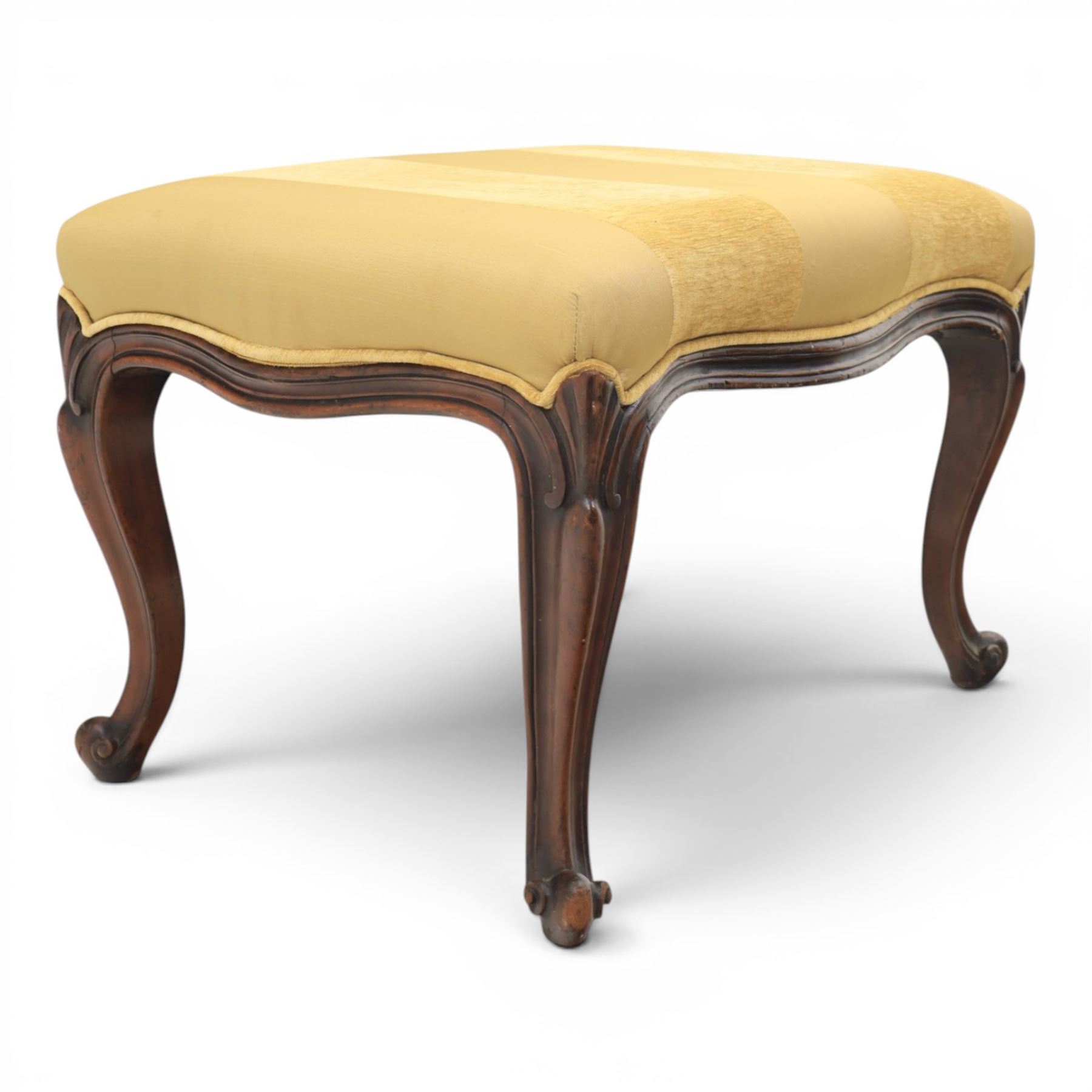 Victorian mahogany Cayley style footstool, serpentine upholstered seat raised on cabriole supports terminating in scroll feet