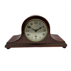 A mahogany cased Tambour clock with a German eight-day movement sounding the quarters and hours on gong rods, with a 6” silvered dial , Arabic numerals and minute track, steel spade hands within a spun brass bezel and convex glass.
With pendulum. 




