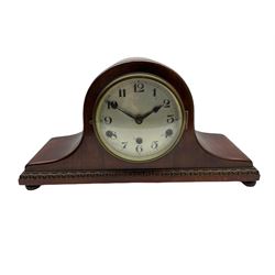 A mahogany cased Tambour clock with a German eight-day movement sounding the quarters and hours on gong rods, with a 6” silvered dial , Arabic numerals and minute track, steel spade hands within a spun brass bezel and convex glass.
With pendulum. 




