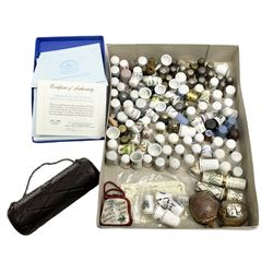 Large collection of thimbles, to include Wedgwood jasperware examples, Spode, cloisonné, together with tape measure in the for of a walnut, hedgehog thimble case etc