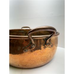 Large copper twin handled pan, together with copper measures, jugs etc, pan D40cm 