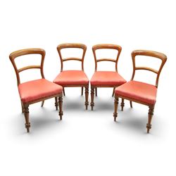 Set of four Victorian mahogany balloon back chairs, with red leather seats 