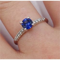 14ct white gold round sapphire ring, with diamond set shoulders, hallmarked