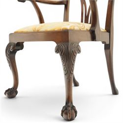 Late 19th century Chippendale style mahogany desk chair, with pierced splat and shaped and scrolled arms, raised on front claw and ball supports