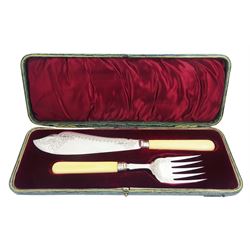 Late Victorian ivory handled fish servers with silver blade and prongs, hallmarked James Deakin & Sons, Sheffield 1897, contained within a fitted case with burgundy silk and velvet lined interior 