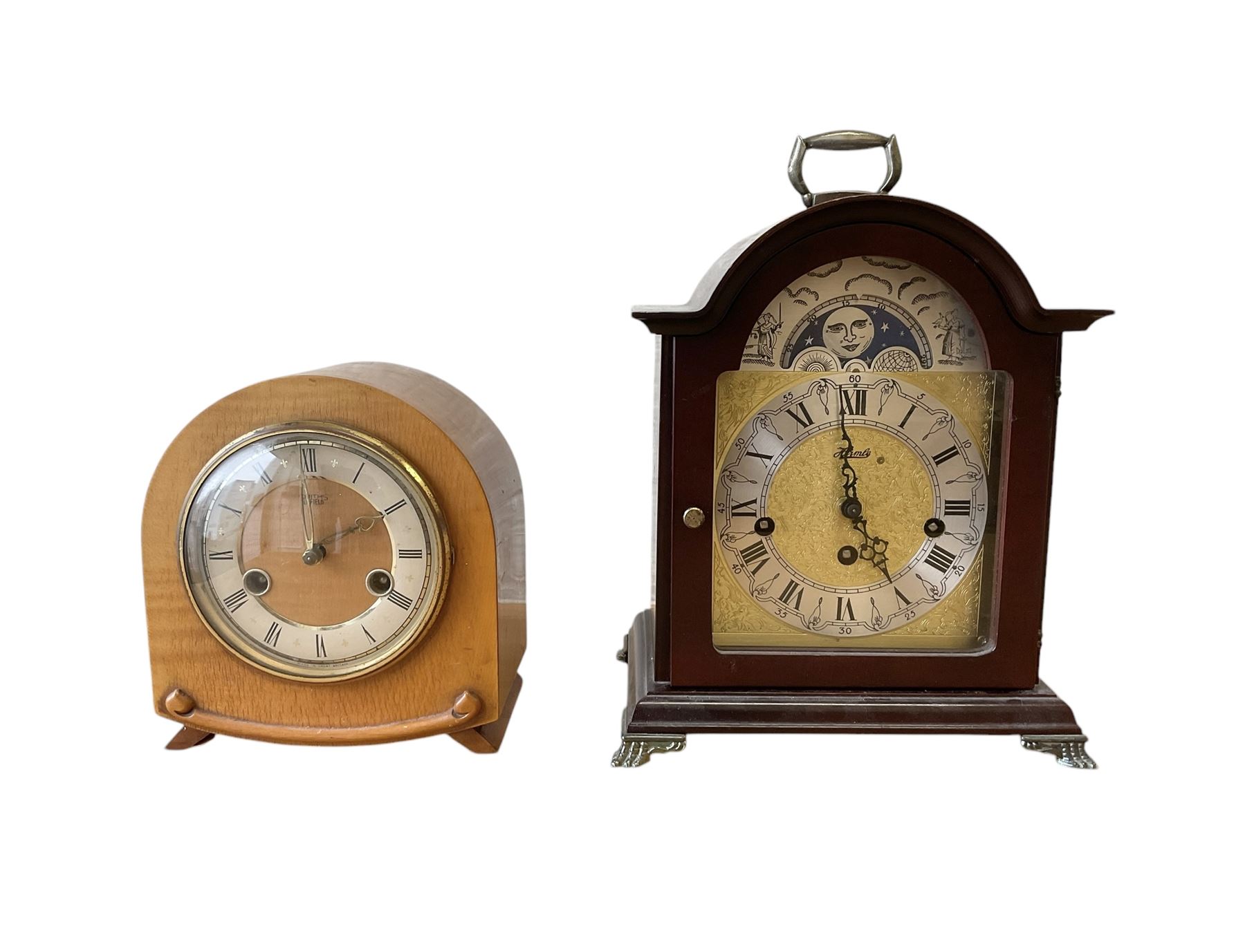 20th century- Hermle 8-day moon phase three train bracket clock, with a brass dial and subsidiary moon dial, floating balance escapement chiming the quarters on 5 gong rods. With an English oak cased Smiths Enfield 8-day striking mantle clock c1950. With pendulum and key.  