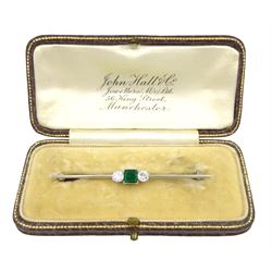 18ct white gold three stone square cut emerald and round brilliant cut diamond brooch, emerald approx 0.50 carat, total diamond weight approx 0.50 carat, in velvet and silk lined case by John Hall, Manchester