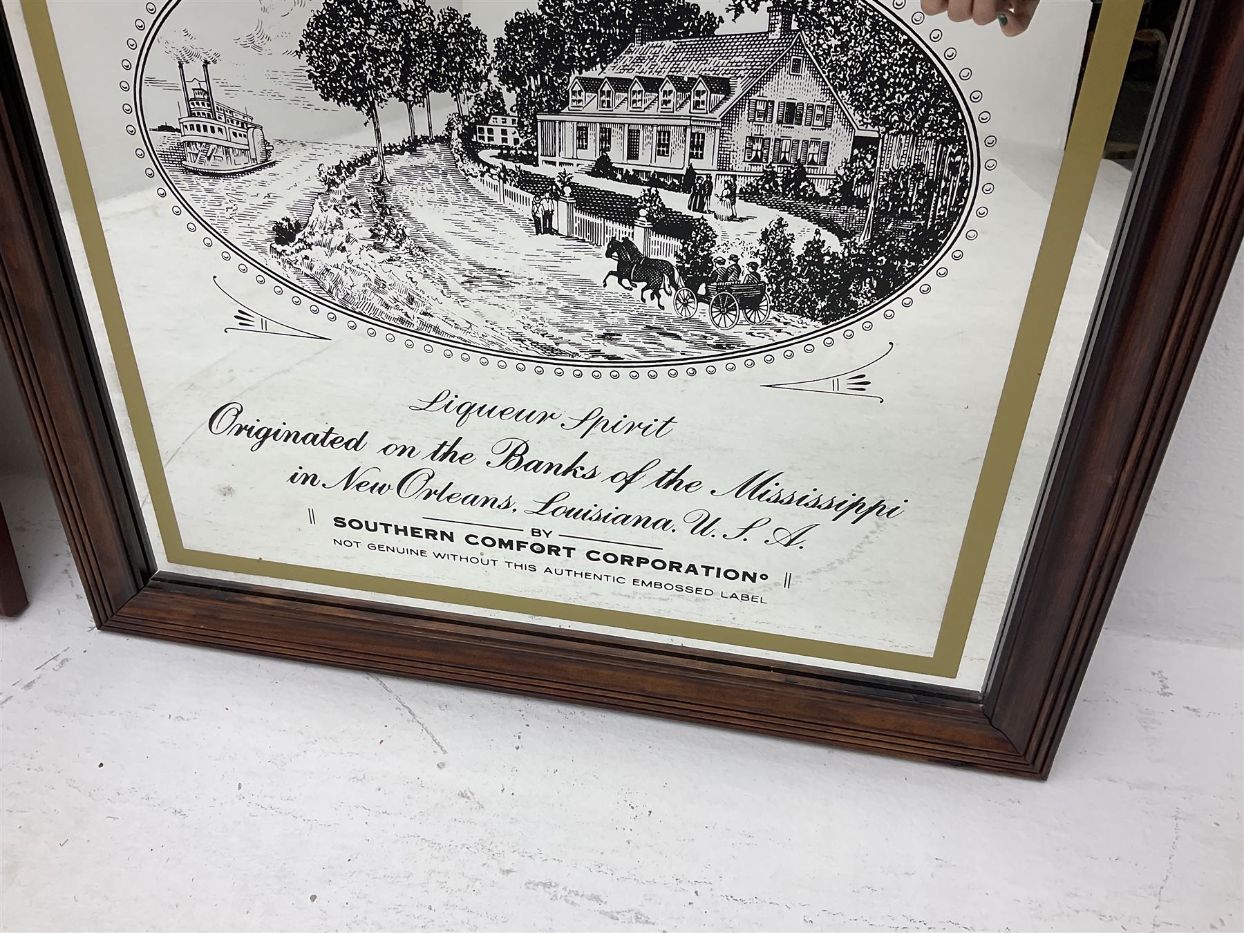 Four advertising mirrors, comprising of Southern Comfort, All Ranks smoke Marcella Cigars, Coca-Cola and Player's Navy Cut, largest example H70cm, L60.5cm