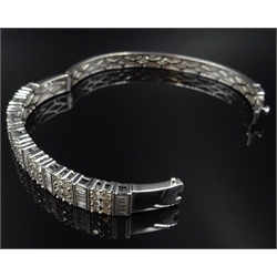  White gold baguette and round brilliant cut diamond hinged bangle, stamped K18, diamonds 2.88 carat  