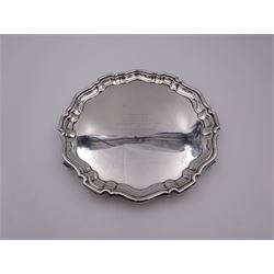 1940's silver waiter, of circular form with Chippendale type rim and personal engraving to centre, upon three scroll feet, hallmarked William Suckling Ltd, Birmingham 1934, D20cm, approximate weight 10.70 ozt (332.9 grams)