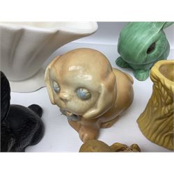 Collection of Sylvac and similar animal figures, including rabbits, hares and dogs, together with Falcon budgie vase, etc 