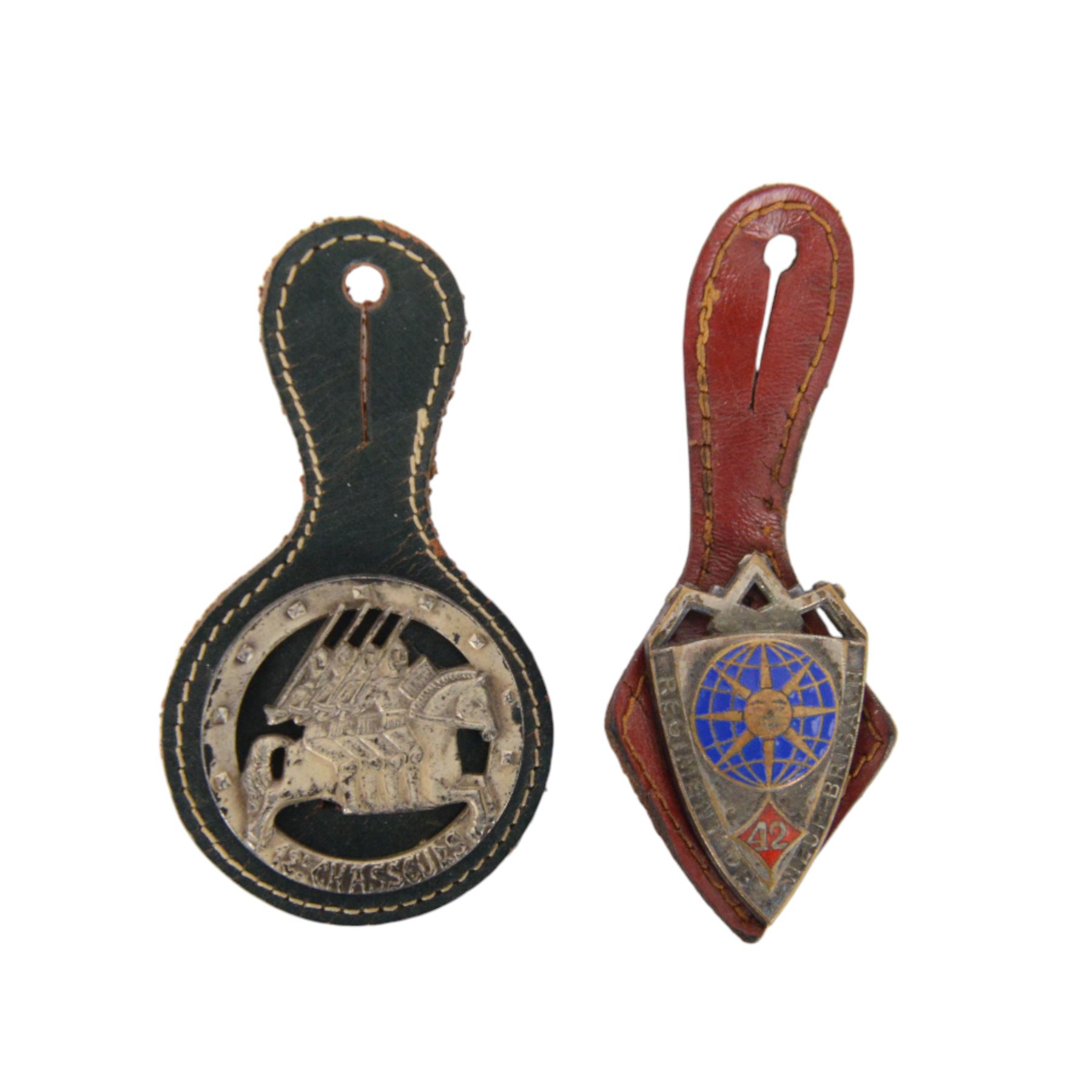 Eight French military badges on fobs from 1939 onwards, including Commandos, Infantry, Tirailleurs, Chasseurs etc