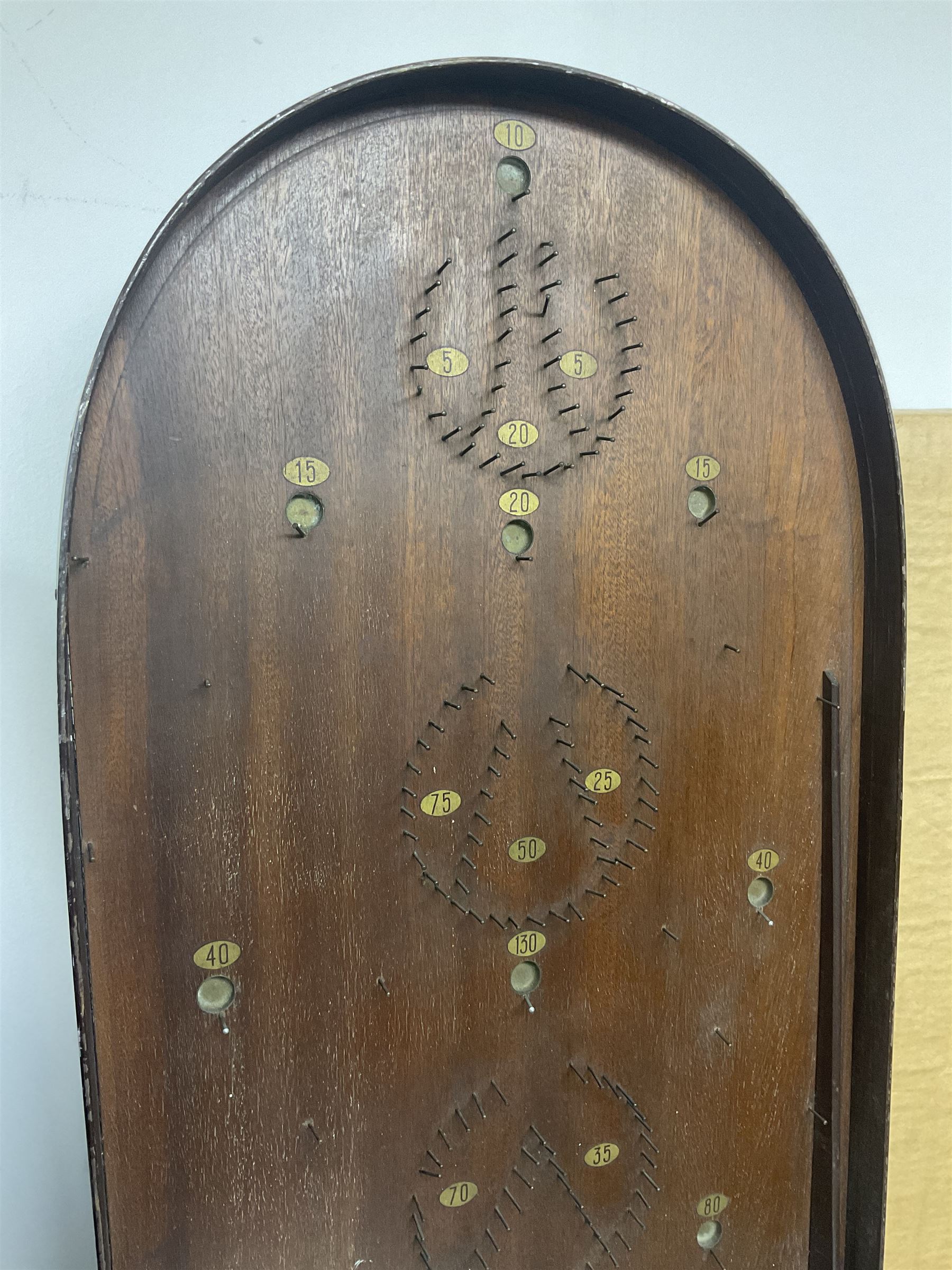 John Jaques and Son ‘Devil Among the Tailors’ wooden vintage skittles game, missing pole and ball, with instruction manual and original box; and a Corinthian Bagatelle board with marbles and push stick 