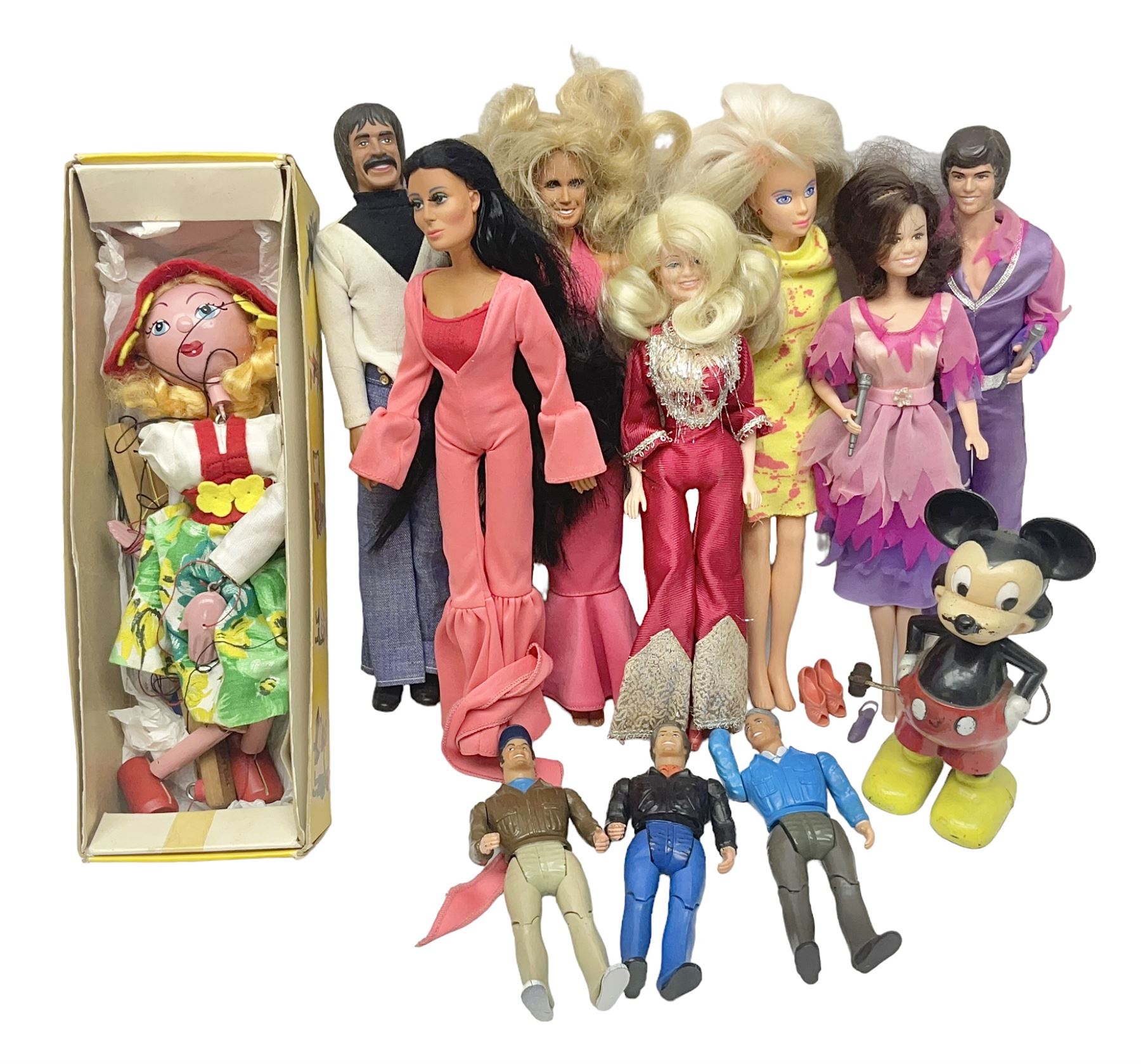 Pelham Puppet - Tyrolean Girl in yellow box; three 'A' Team action figures; clockwork plastic Mickey Mouse figure; and seven various fashion dolls (12)