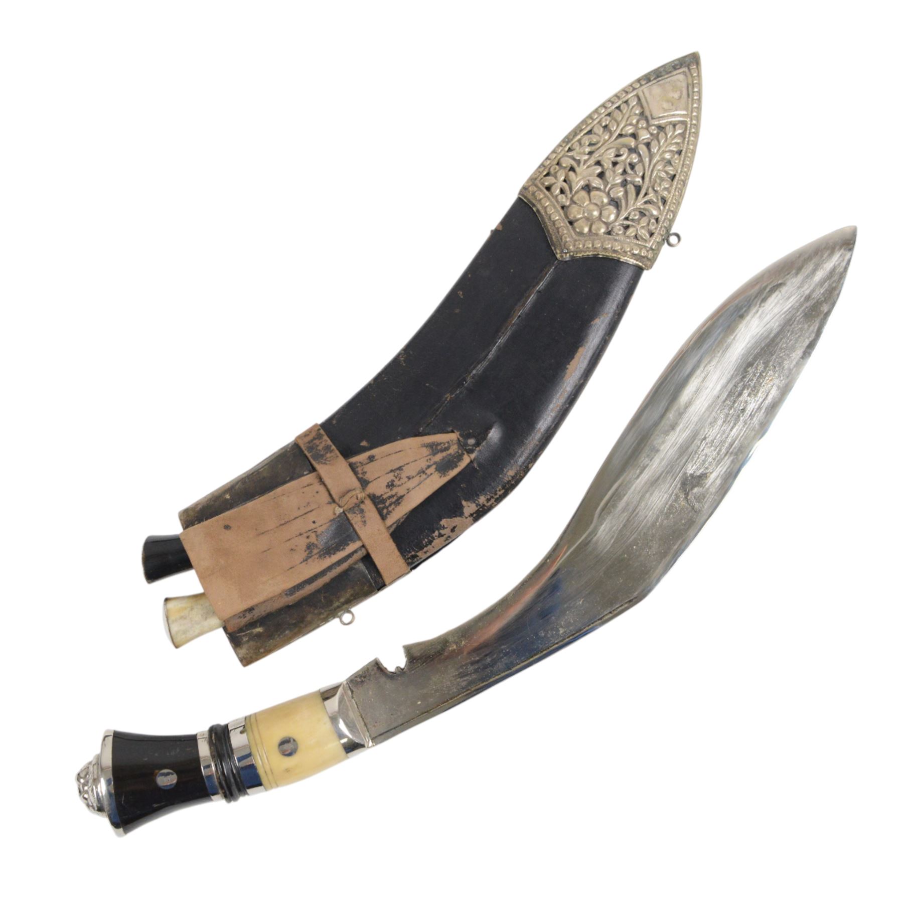 Pair of kukri knives, with with ebonised and bone handles, with two smaller knives, with a leather scabbard with floral silvered decoration, L44cm
