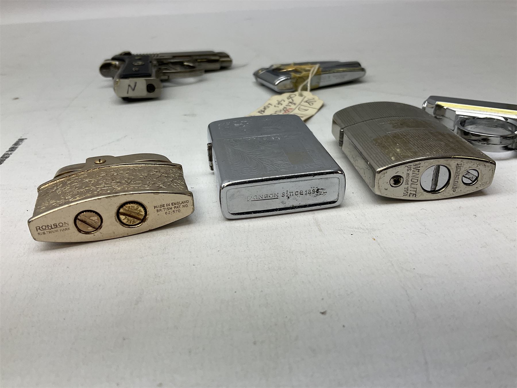 Collection of lighters to include examples by Ronson, Kingsway and Penguin, mother of pearl and engine turned examples, together with quantity of cigarette cases