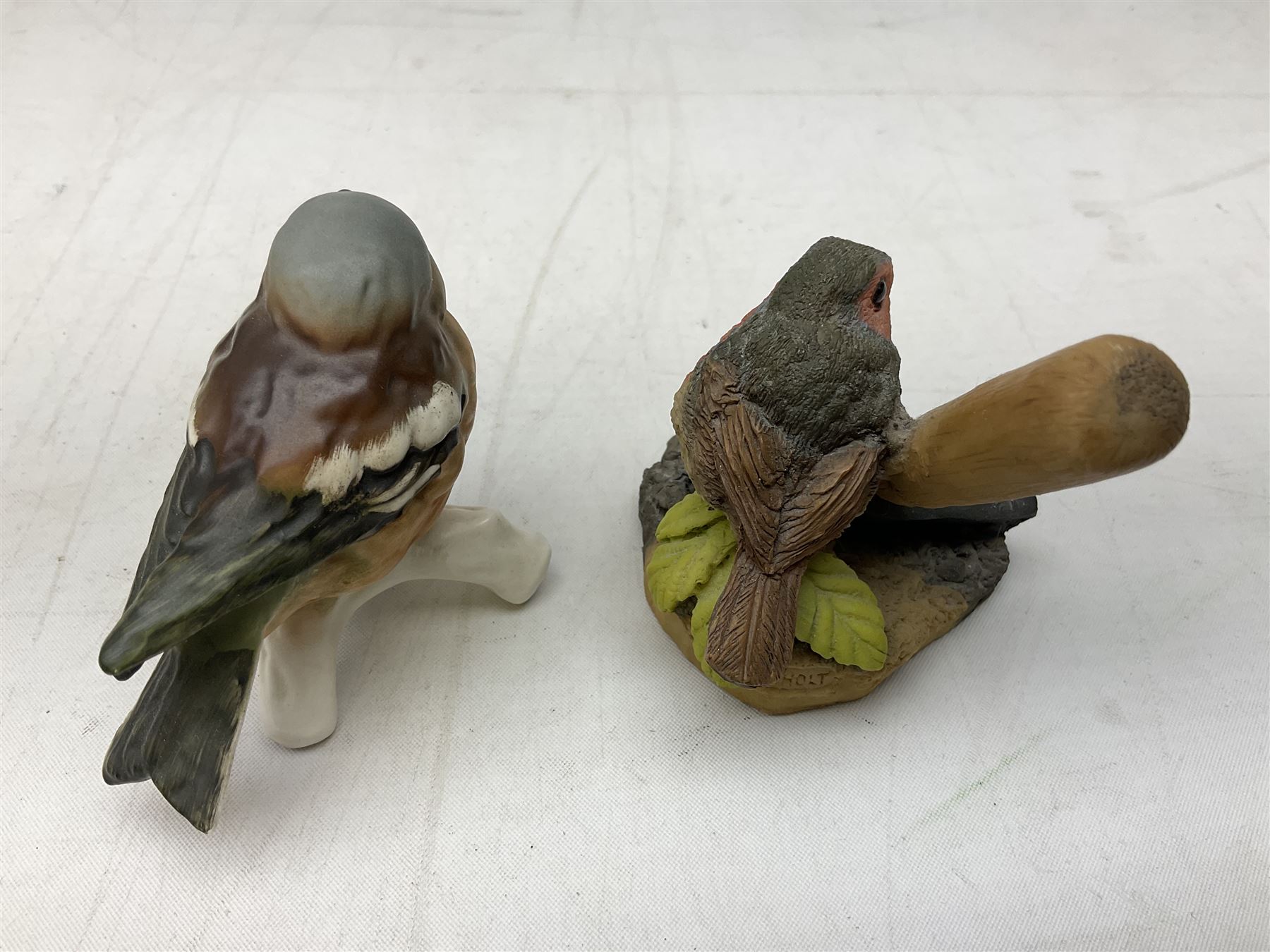 Lladro figure Ingenuine Woman no. 5487 (a/f), Nao figure, Goebel bird figure CV86 1967, Goebel Chaffinch 38023-06, Arden Scultpures robin figure group etc