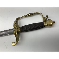 Five-ball spadroon sword with 78.5cm fullered steel blade and brass hilt with fluted swollen grip; in brass mounted leather scabbard, the locket with traces of the makers name John Knubley 11 Charing Cross L97.5cm overall