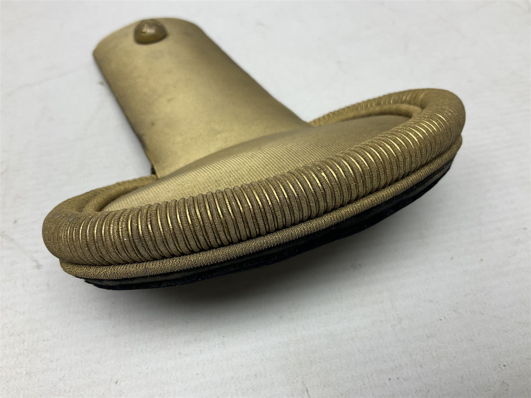 WW1 French pair of Coloniale Artillerie Epaulettes, plain gold colour, one with tassels; in open box bearing Ecole Saint Cyr label; together with WW2 French Artillery Officer's greatcoat; bears label 'P. Vauclair 40 Boul. du Montparnasse Paris (inscribed to) Mr. Babin Le 17/4/40 No.674' (2)
