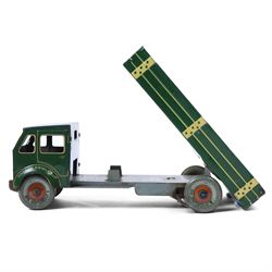 Mettoy tin plate clockwork Dunlop 90 tipper truck, in green and cream livery, H10cm, L28cm