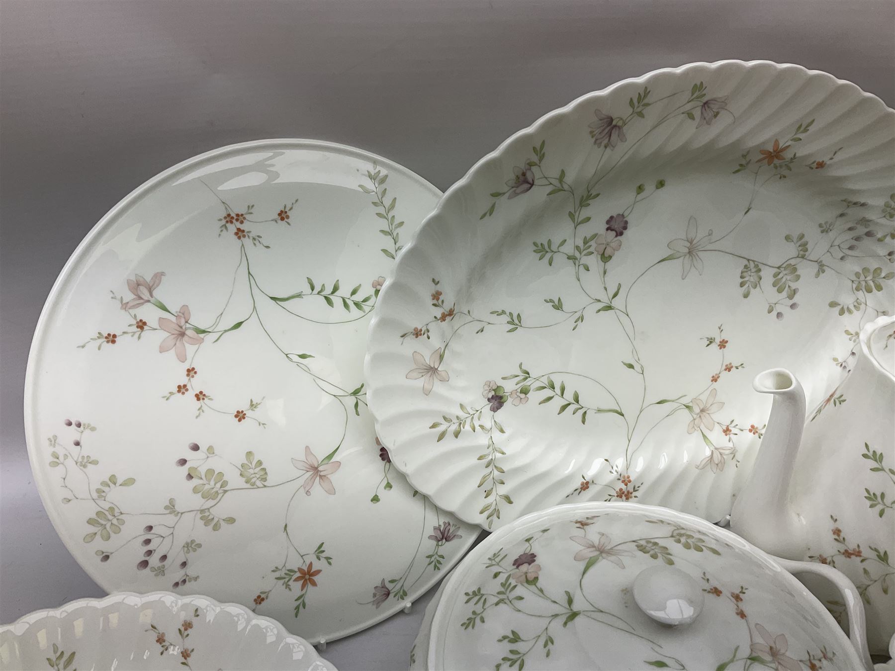 Wedgwood Campion pattern tea and dinner wares for eight, comprising twin handled lidded tureen, eight teacups and saucers, eight side plates, coffee pot. sauce boat and stand, open sucrier and milk jug, butter dish, oval serving plate, bowl, etc, together with Royal Doulton Citrus Grove ceramics