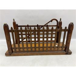 Early 20th century novelty letter rack modelled as a gate and picket fence, with brass post finials, on pine base, L43cm