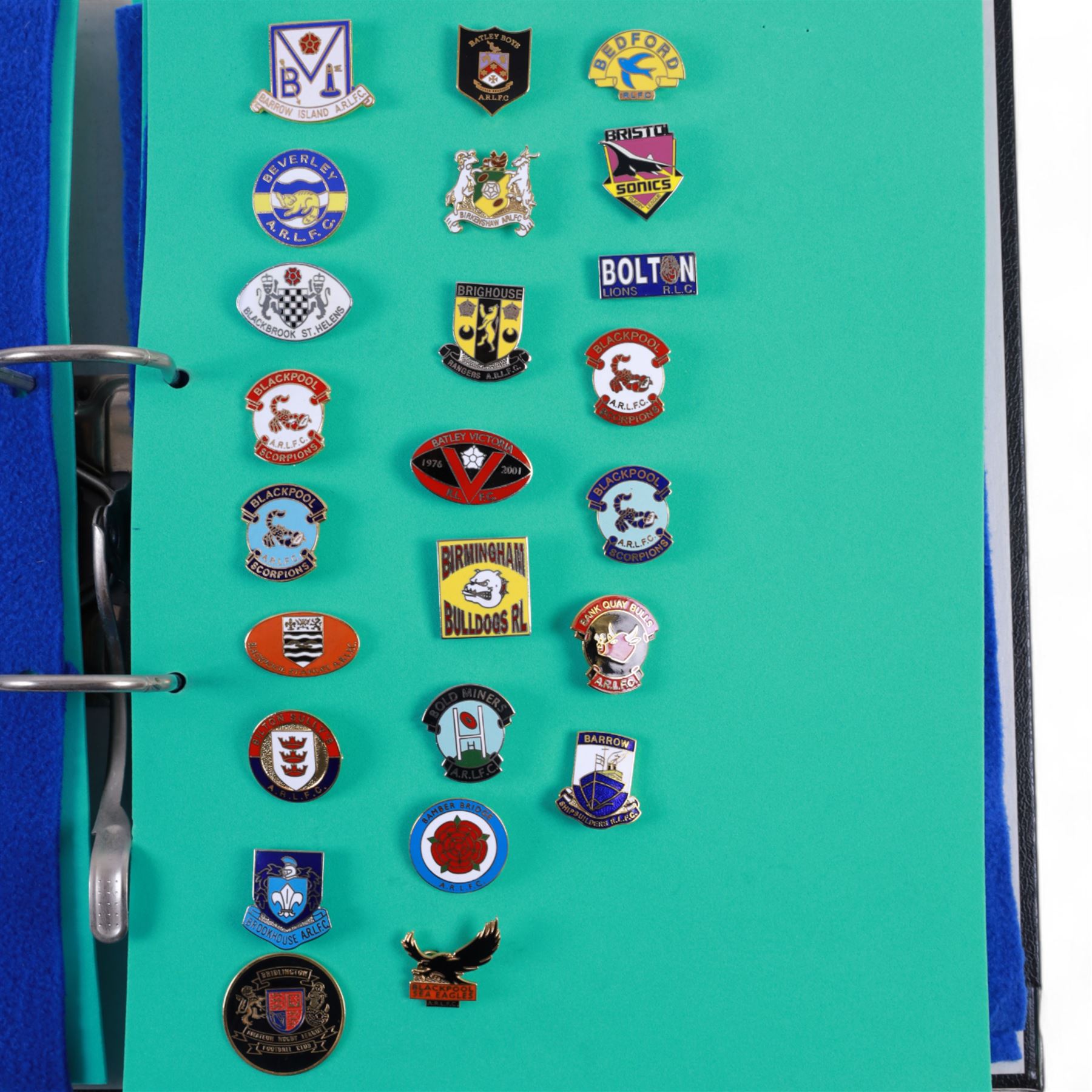 Amateur rugby league enamel badge collection, teams including Birmingham Bulldogs, Bridlington, Dudley Hill, Duke of York, Edinburgh Eagles, Guiseley, Rangers, Huntingdon, Keighley Town, Leigh Miners, Pilkington Recs, St Josephs, Thornhill Trojans, West London Sharks etc, all displayed in three folders and six amateur league badges from Leeds & District, Hull & District, York & District, Warrington, Lancashire County and Yorks County in box display, (approximately 270)
