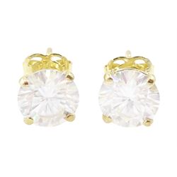 Pair of 9ct gold moissanite earrings, each stud set with a single round brilliant cut moissanite