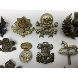 Two Edwardian hallmarked silver presentation fobs for military bugling competitions; and quantity of cap/glengarry and other badges, sweetheart brooches etc