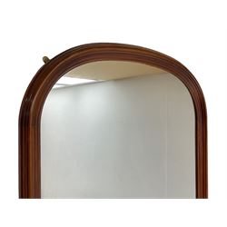 Mahogany dressing table, raised arched mirror in moulded frame, the table fitted with drawers and cupboards, on turned and fluted supports