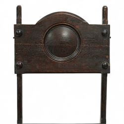 Arts & Crafts oak metamorphic chair, circular panelled back above hinged seat opening into a set of library steps with brass securing straps, circa 1900