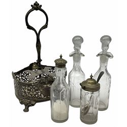 Two Georgian silver toddy ladles with baleen twist handles, (neither hallmarked), one with inset coin to bowl, together with a group of silver plate including cruet stand enclosing two glass bottles with stoppers, shaker and preserve pot with spoon, pair open salts with glass liners, etc. 