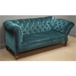  Early 20th century two seat Chesterfield drop end sofa, upholstered in deeply buttoned dark teal fabric, tapering supports, W165cm  