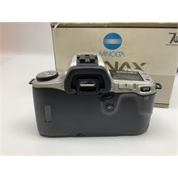 Four Minolta camera bodies, to include Dynax 500si, serial no. 94812651 with 'Signa Zoom 1;3.5-4.5 f=28-70mm' lens, Maxxum 300si, serial no. 97821665, with 'Tamron AF 80-210mm' lens and Dynax 300si, serial no 01603265'  with Minolta AF Power Zoom 35-80mm 1;4' lens, etc, together with Pantax MV1 camera bodies and other camera equipment 