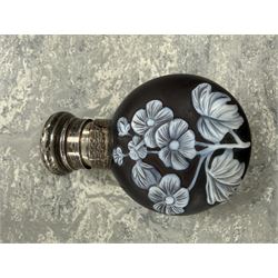 Victorian Thomas Webb silver mounted cameo glass scent bottle, hallmarked Sampson Mordan and Co, London 1884, the cameo glass body of circular form, decorated with white flowers and foliage in high relief upon a black ground, the hinged cover opening to reveal the original stopper, H6cm 