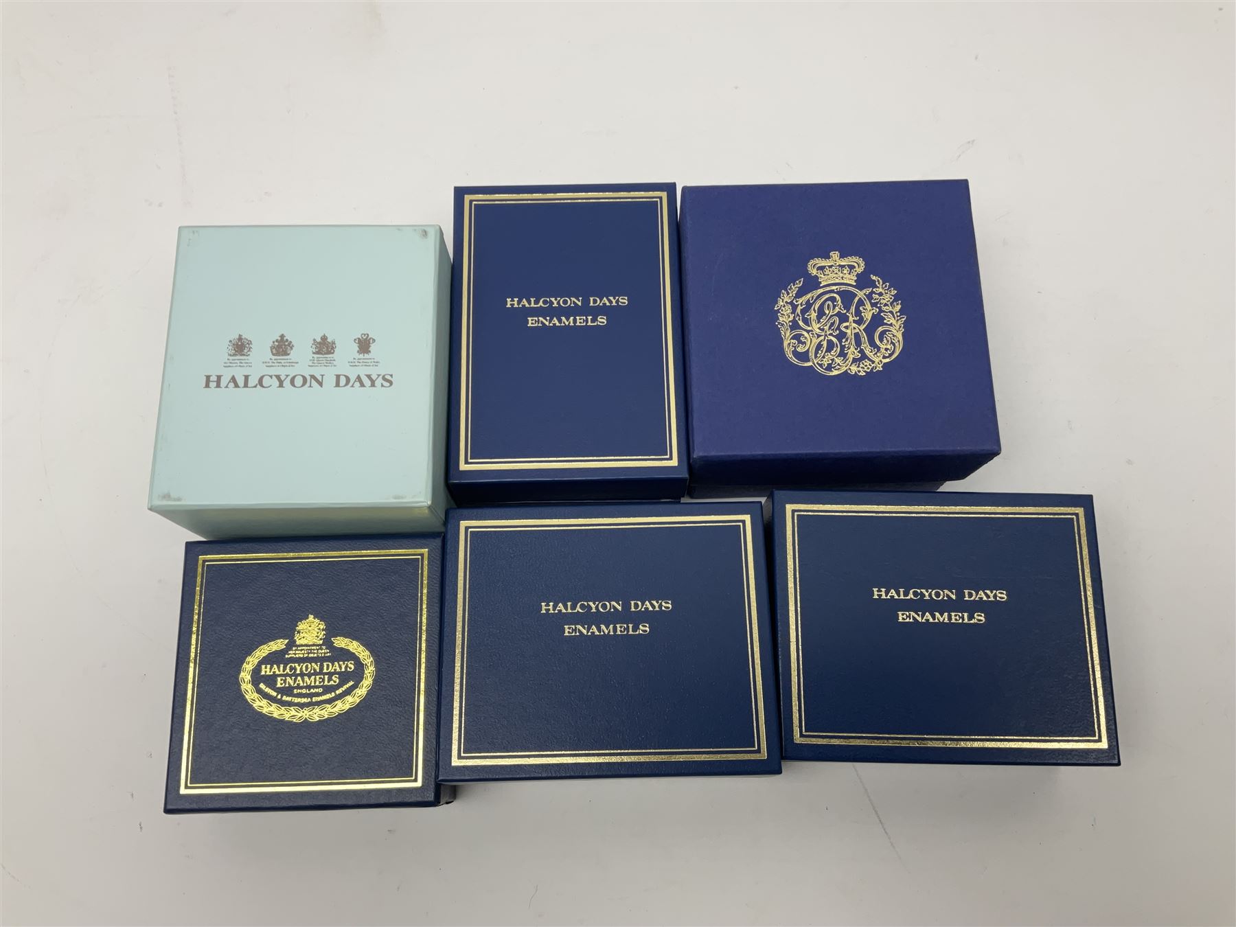 Five Halcyon Days Royal commemorative enamel boxes and one other