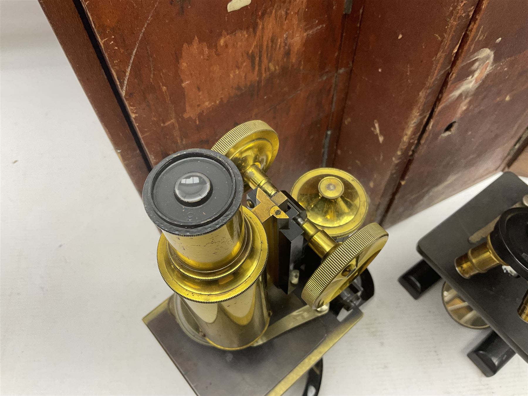 Three boxed microscopes, comprising Hawkslay & Sons Spencer Buffalo microscope no 68177, J Swift & Son microscope and R & J Back microscope no 30241