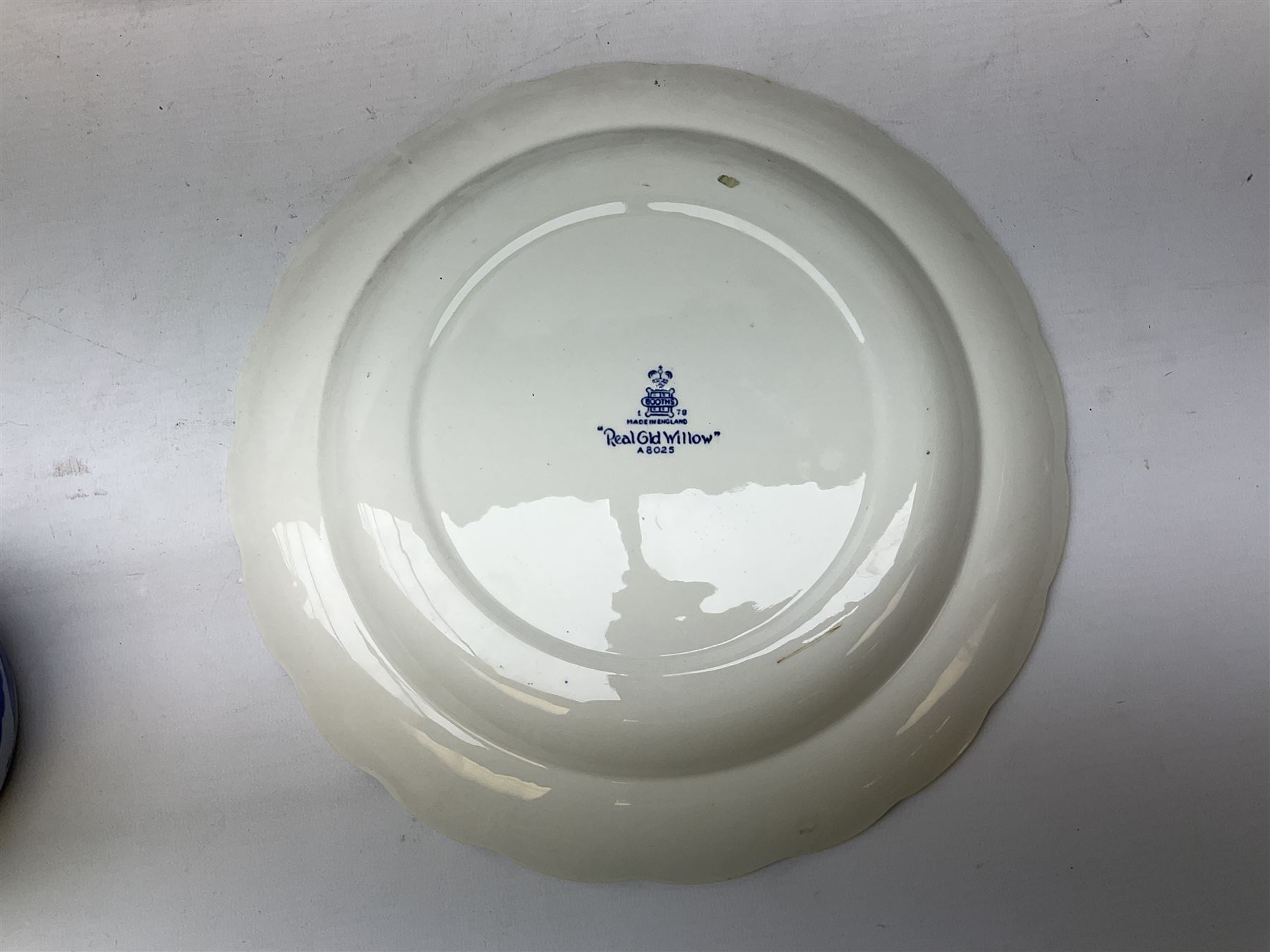 Quantity of blue and white ceramics to include Spode Italian pattern shallow bowl, Booths plate decorated with willow pattern, Wedgwood Jasperware tulip vase, T.G Green Cornish ware lidded storage jar, Delft style ceramics etc in two boxes