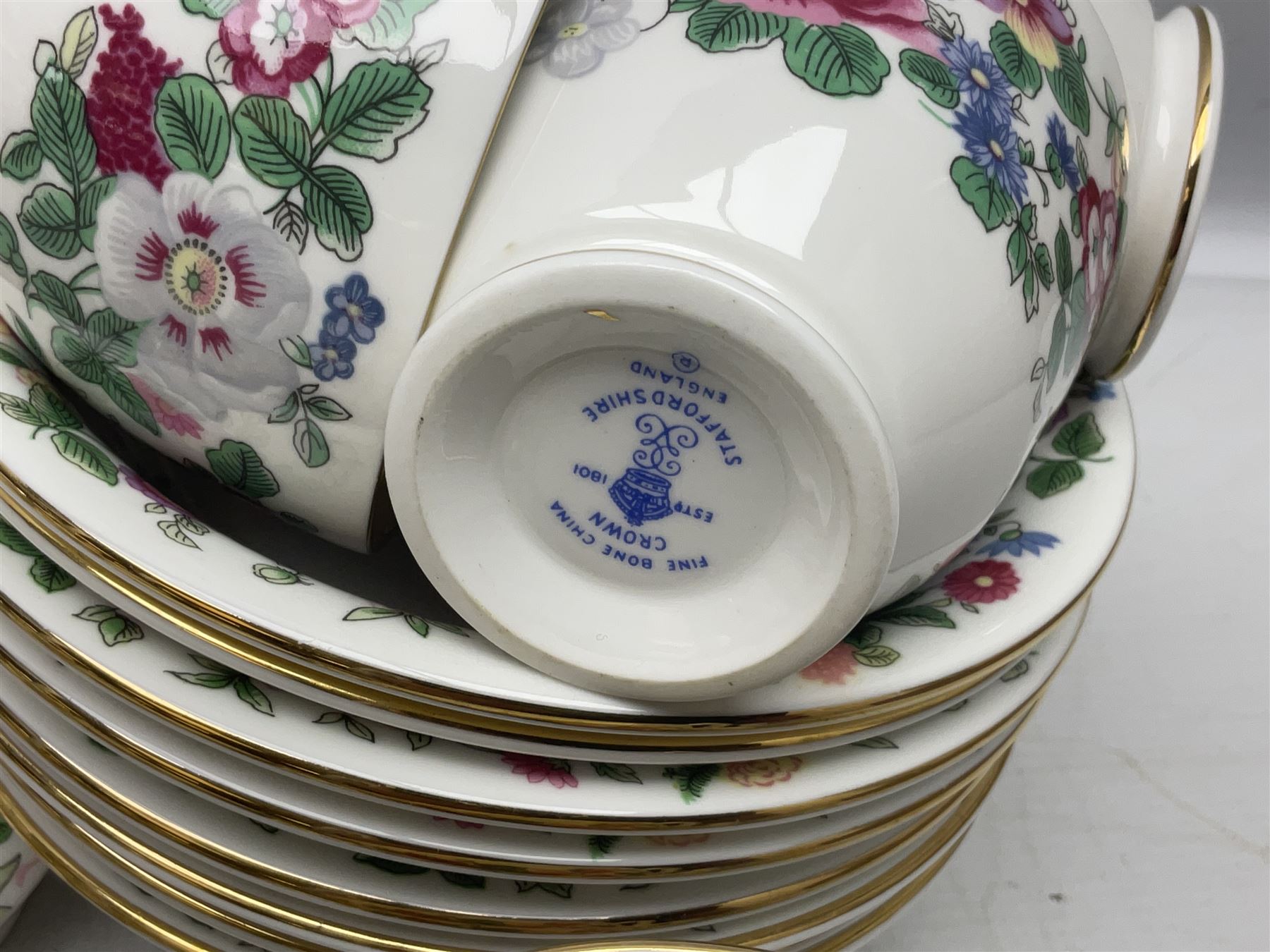 Crown Staffordshire Thousand Flowers pattern part tea service, to include teapot, two open sucriers, eighteen cups, fifteen saucers etc (57)