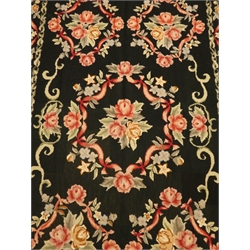  Modern black ground cross stitch rug, floral field and repeating border, 167cm x 103cm  