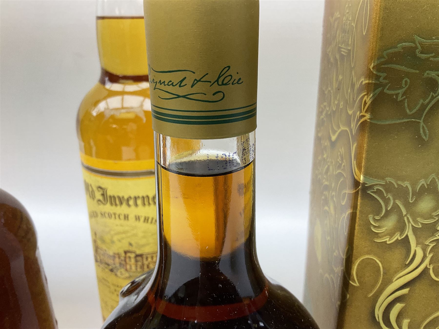 Mixed alcohol comprising Old Inverness Aged Scotch whisky, J.G.Thomson