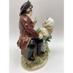 Two late 18th/early 19th century Berlin porcelain figure groups, the first example modelled as a young boy offering a hat containing apples to a young girl seated upon a stump rising from a naturalistically modelled oval base, the second modelled as a young girl playing an instrument for a young boy seated by her side, upon naturalistically modelled oval base, each with blue underglaze sceptre mark beneath, tallest H16cm