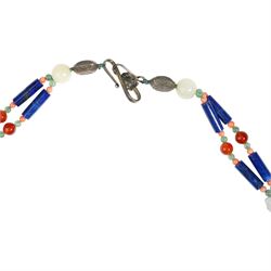 Chinese stone set necklace, with carved buddha disc, carved agate rabbits, lapis lazuli bi disc beads, coral and other hardstone beads