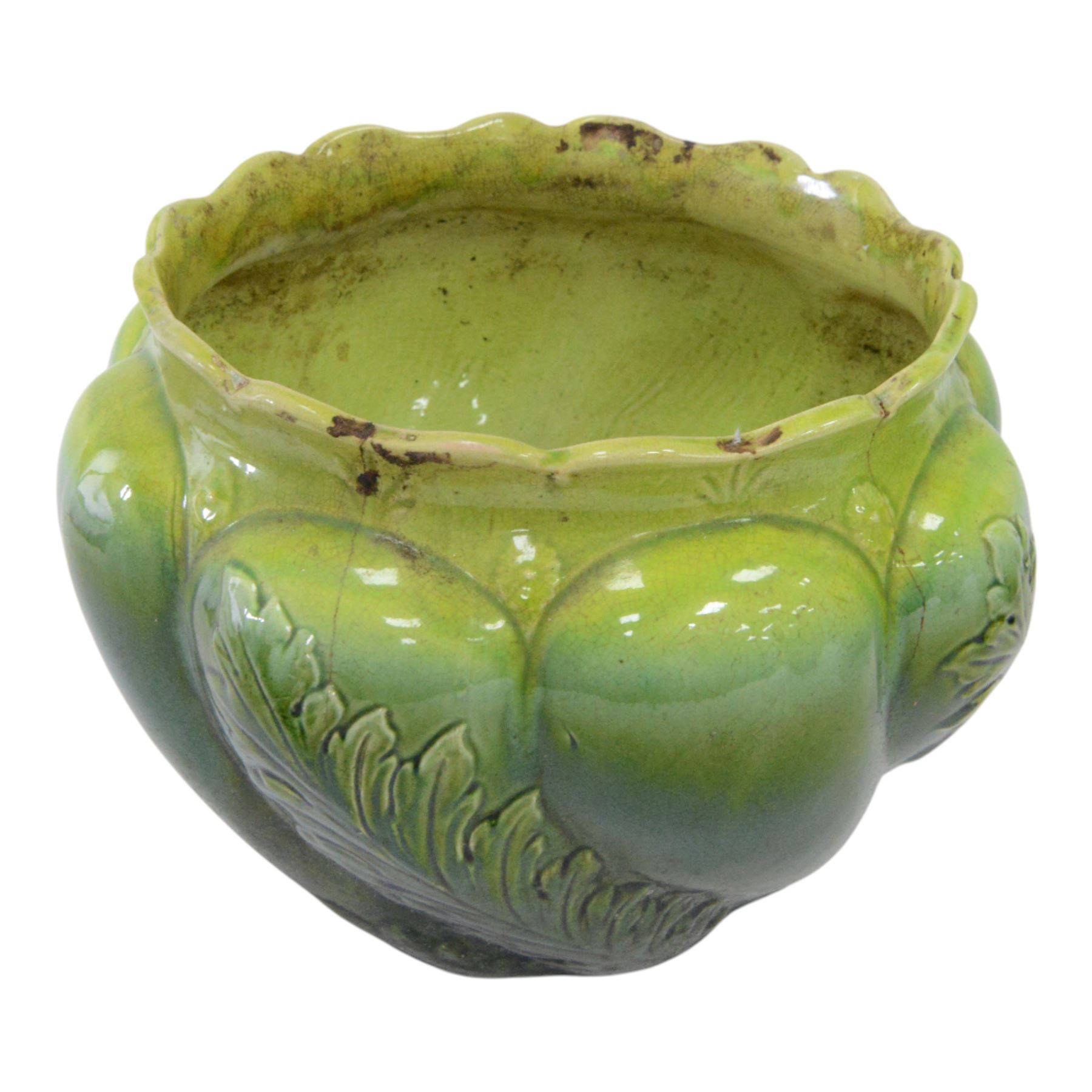 Bretby jardinière, decorated in relief with elongated leaves, together with two others, H29cm 