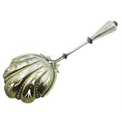 20th century Sterling silver sifting spoon, probably American, the gilt pierced and fluted bowl with lobed edge and ivy leaf mount, upon a stem with tapering terminal with knop finial, stamped STERLING, L20.5cm, approximate weight 2.18 ozt (68 grams)
